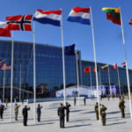 Nato began a 12-week staged move to new headquarters
